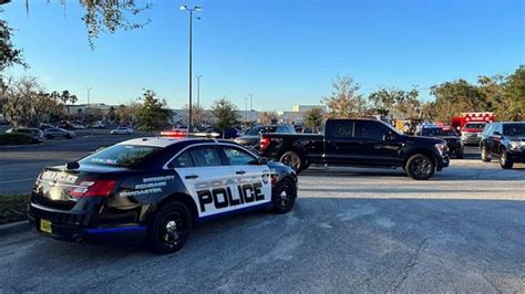 A man is killed and a woman injured in a 'targeted' afternoon shooting at a Florida shopping mall